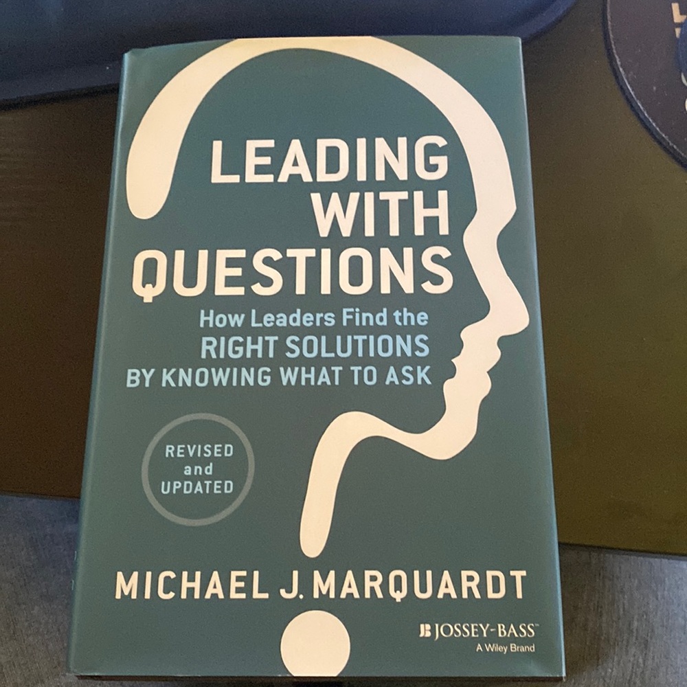 Hardcover book 📖 “Leading with Questions “